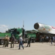 Pulled by two lorries, the low-loader leaves the airport with the once fastest passenger aircraft in the world.